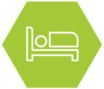 Hospitality icon on a green hexagonal background